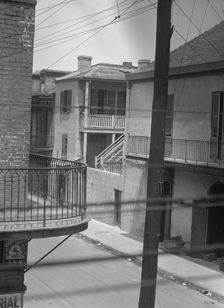 Street scene, New Orleans, between 1920 and 1926. Creator: Arnold Genthe