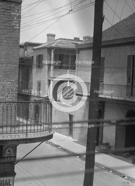 Street scene, New Orleans, between 1920 and 1926. Creator: Arnold Genthe.