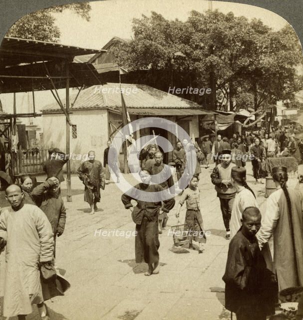 Street scene, Canton, China.Artist: Underwood & Underwood