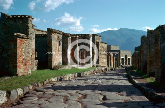 Street scene in Pompeii with Vesuvius in the background, 1st century. Creator: Unknown.