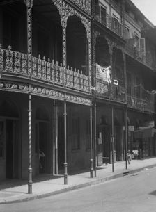 Street scene in the French Quarter, New Orleans, between 1920 and 1926. Creator: Arnold Genthe