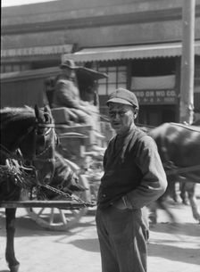 Street scene, possibly in Chinatown, San Francisco, between 1896 and 1942. Creator: Arnold Genthe