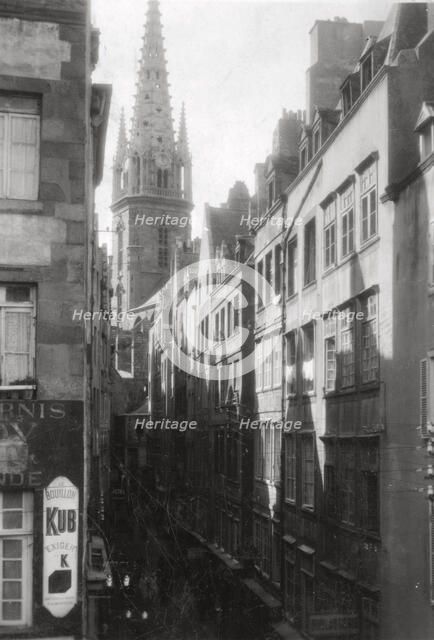Street scene, showing the cathedral spire, St Malo, Brittany, France, 20th century. Artist: Unknown