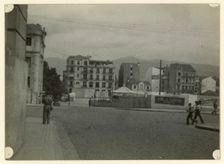 Street scene, Spain, early-mid 20th century. Creator: Edward Morland Lewis