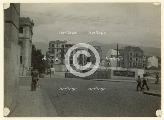 Street scene, Spain, early-mid 20th century. Creator: Edward Morland Lewis.