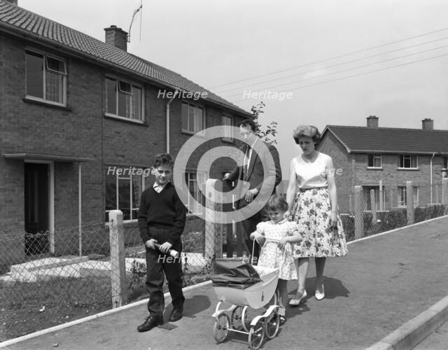 Street scene with family, Ollerton, North Nottinghamshire, 11th July 1962. Artist: Michael Walters