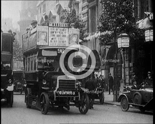 Street Scenes in Savoy Hill, London, with Buses Driving Through, 1922. Creator: British Pathe Ltd.