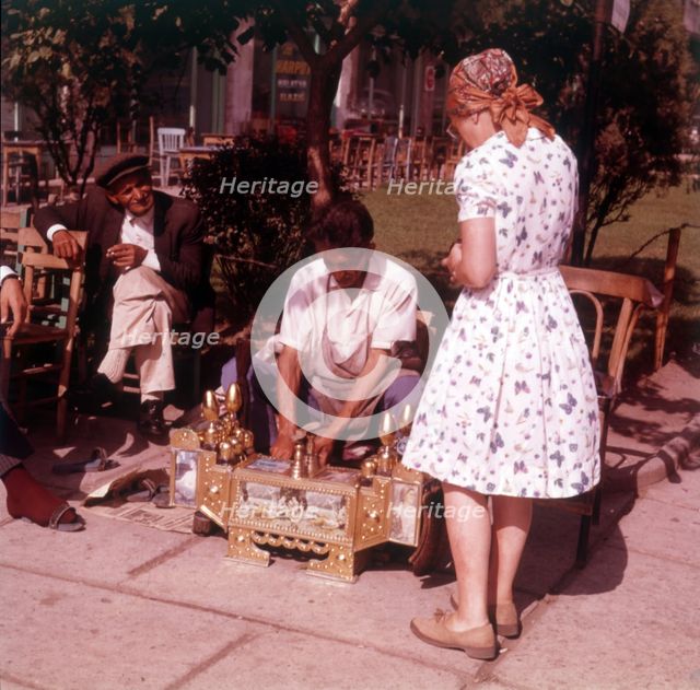 Street vendor of sweetmeats, Istanbul, Turkey, c1955.  Creator: Arthur Charles Kirby Ware.