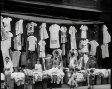 Street View of Street Market Selling Clothes in New York City, 1932. Creator: British Pathe Ltd