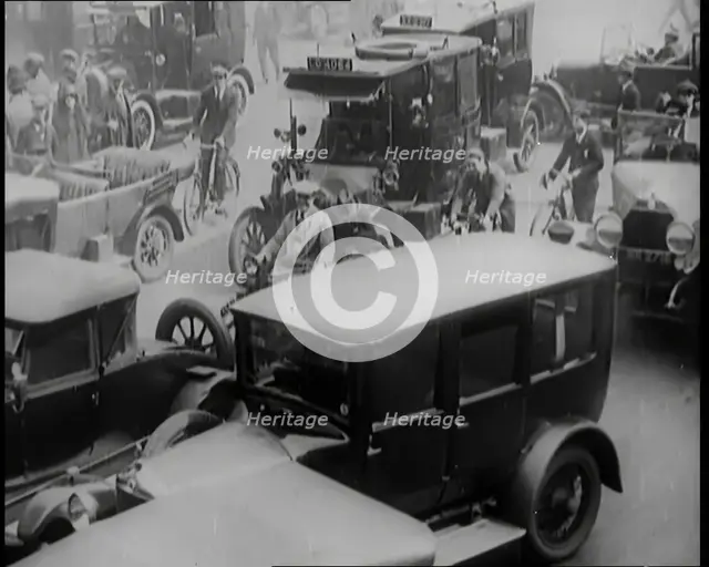 Streets Filled With Heavy Traffic and Pedestrians in London, 1926. Creator: British Pathe Ltd.