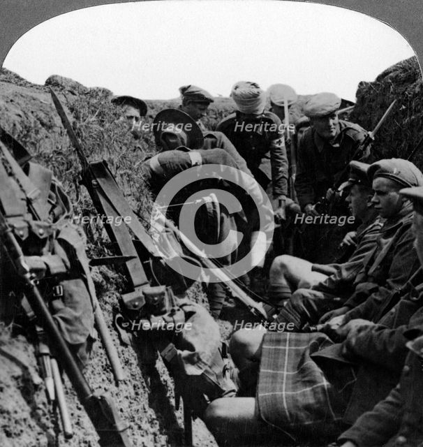 Stretcher bearers removing a wounded officer, World War I, 1914-1918.Artist: Realistic Travels Publishers