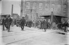 Strikers leave mills, Passaic, between c1910 and c1915. Creator: Bain News Service