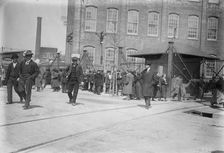 Strikers leave mills, Passaic, between c1910 and c1915. Creator: Bain News Service