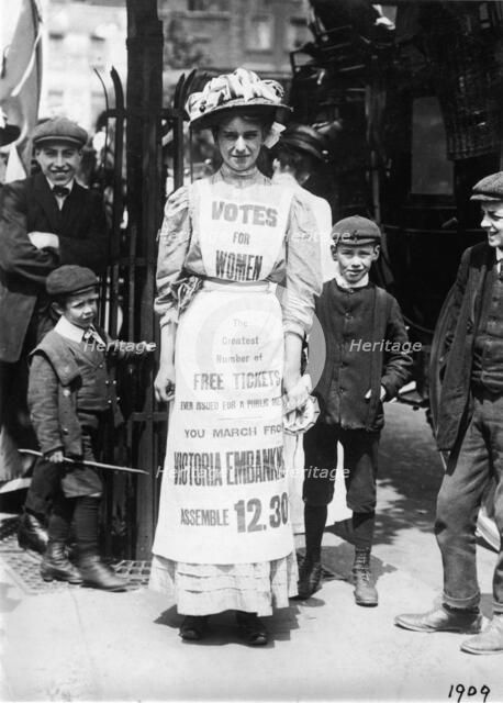 Suffragette advertising a march supporting votes for women, Strand, London, c1909. Artist: Unknown