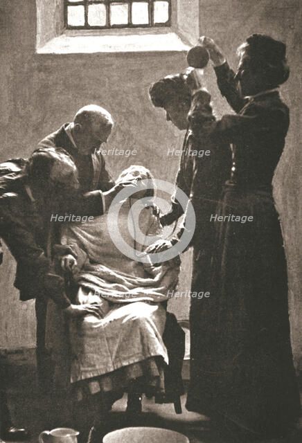 Suffragette being force fed with the nasal tube in Holloway Prison, London, 1909. Artist: Unknown