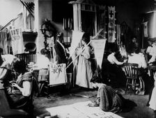 Suffragettes making banners for the procession to Hyde Park on 23rd July 1910