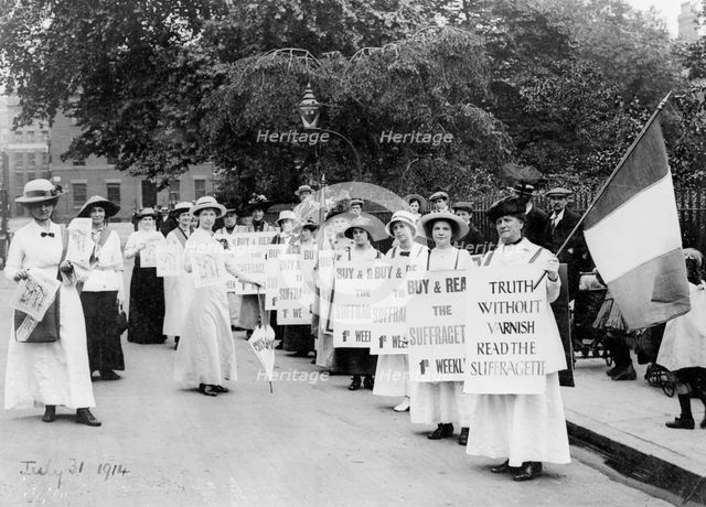 Suffragettes on a 'poster parade' selling the "Suffragette", 31st July, 1914. Creator: Unknown.