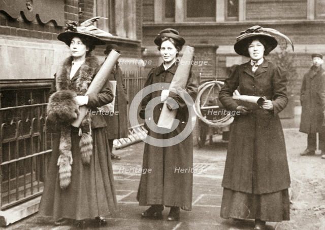 Suffragettes armed with materials to chain themselves to railings, 1909. Artist: Unknown