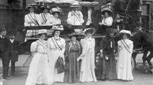 Suffragettes in Votes for Women sashes, c1910. Creator: Unknown