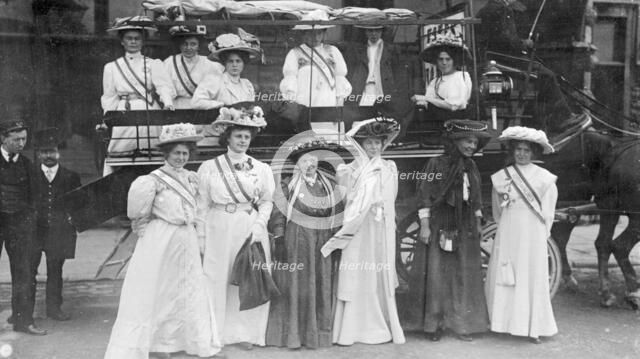 Suffragettes in 'Votes for Women' sashes, c1910. Artist: Unknown
