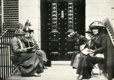 Suffragettes waiting on the doorstep of Sir Edward Carson's London home, 6 April 1914, (1947). Creator: Unknown