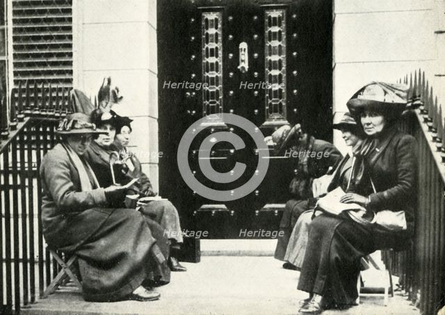 Suffragettes waiting on the doorstep of Sir Edward Carson's London home, 6 April 1914, (1947). Creator: Unknown.