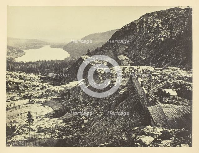 Summit of Sierra Nevada, Snow Sheds in Foreground, Donner Lake in the Distance, C. P. R. R., 1868/69 Creator: Andrew Joseph Russell.