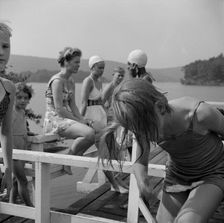 Sun bathing on Lake Tiorati, Camp Christmas Seals, Haverstraw, New York, 1943. Creator: Gordon Parks