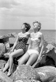 Sunbathing by the Oresund, Bostahusen, Landskrona, Sweden, 1965. Creator: Unknown