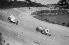 Sunbeam of EL Bouts and Vauhall 30/98 of RJ Munday, BARC meeting, Brooklands, 16 May 1932. Artist: Bill Brunell