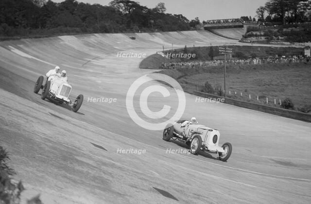 Sunbeam of EL Bouts and Vauhall 30/98 of RJ Munday, BARC meeting, Brooklands, 16 May 1932. Artist: Bill Brunell.
