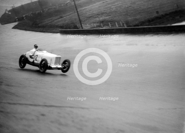 Sunbeam racing at a BARC meeting, Brooklands, 16 May 1932. Artist: Bill Brunell.