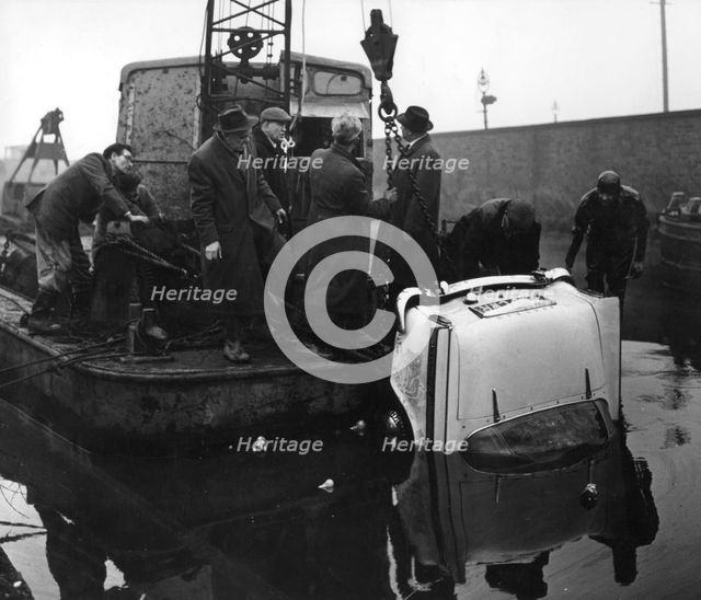Sunbeam Rapier car accident, Kilnhurst, South Yorkshire, 1964.  Creator: Michael Walters.