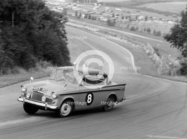 Sunbeam Rapier racing at Brands Hatch, Kent, 1961. Artist: Unknown