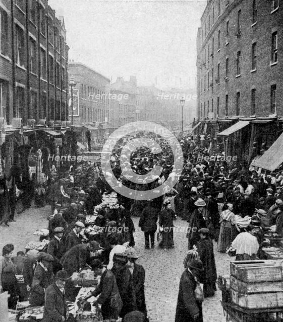 Sunday market, Wentworth Street, East London, c1930s. Artist: Unknown
