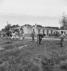 Sunday morning on the Baxter part-time farms project, Arizona, 1938. Creator: Dorothea Lange