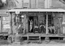 Sunday afternoon - country store on dirt road, Gordonton, North Carolina, 1939. Creator: Dorothea Lange