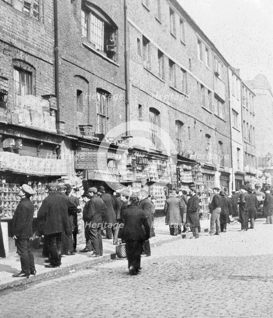 Sunday bird fair, Sclater Street, off Brick Lane, London, c1900. Creator: John Galt.