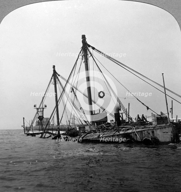 Sunken warship HMS 'Vindictive', Ostend, Belgium, World War I, 1918.Artist: Realistic Travels Publishers