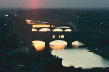 Sunset over the Arno, Florence, Italy. Creator: Peter Thompson