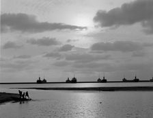 Sunset across the harbor, Buffalo, N.Y., c.between 1910 and 1920. Creator: William H. Jackson