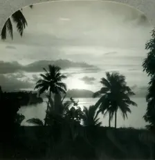 Sunset behind Moorea, Seen from Papeete, Island of Tahiti c1930s. Creator: Unknown
