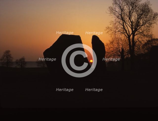 Sunrise on Megalithic Circle, Avebury, Wiltshire, 20th century. Artist: CM Dixon.