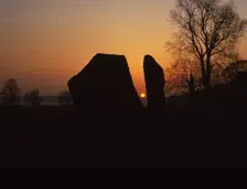 Sunrise on Megalithic Circle, Avebury, Wiltshire, 20th century. Artist: CM Dixon