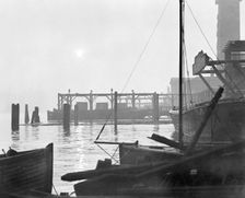 Sunrise over Lambeth waterfront looking east, London, early 1930s. Creator: George Davison Reid
