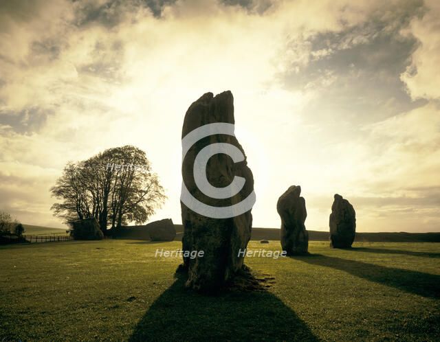 Sunrise over the stones, Avebury Stone Circle, Wiltshire, 1990. Artist: Unknown