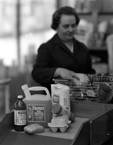 Supermarket checkout, Mexborough, South Yorkshire, 1966. Creator: Michael Walters