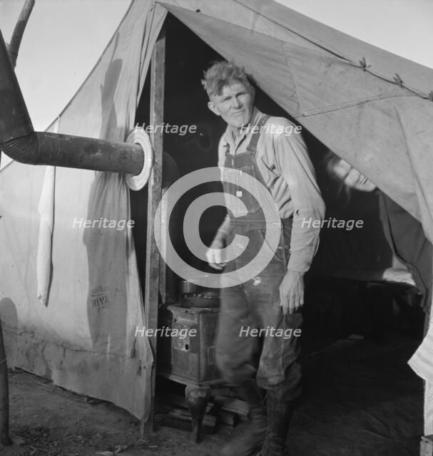 Supper time in FSA migratory emergency camp...the pea fields, Calipatria, CA, 1939. Creator: Dorothea Lange.
