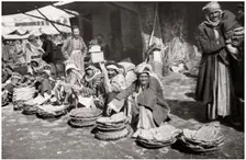 Suq El Khubur, a native bread market, Baghdad, Iraq, 1925.Artist: A Kerim