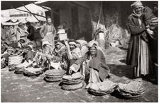 Suq El Khubur, a native bread market, Baghdad, Iraq, 1925.Artist: A Kerim